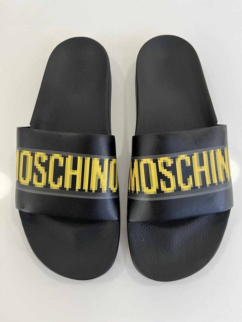Moschino Size 8 Black Slides with Gold Logo Band
